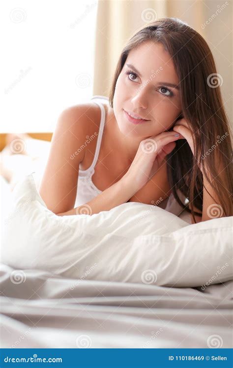 Beautiful Brunette Lying On Bed At Home Stock Image Image Of Portrait