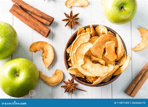 Dried Apples In A Wooden Bowl Ripe Green Apples On The Table Stock