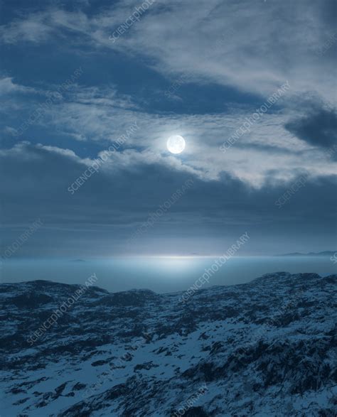 Full Moon over snowy landscape - Stock Image - C059/7468 - Science Photo Library