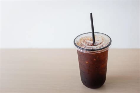 Iced Americano Black Coffee Cup On The Table In A Coffee Shop 6847983