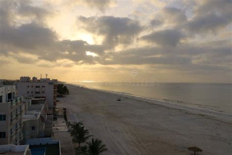 Sunrise at Salalah Beach in Oman Stock Photo - Image of evening ...