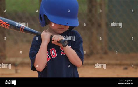 Kids playing baseball Stock Photo - Alamy