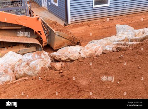 During The Landscaping Work On Construction Site A Bulldozer Performs