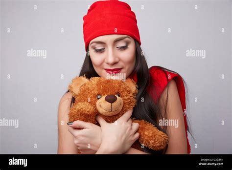 Brunette With A Teddy Bear Stock Photo Alamy