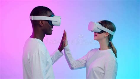 Virtual Future Relations Side View Of Multiethnic Couple In Vr Goggles Touch Hands Isolated