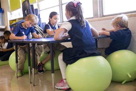 Wobble chairs, bouncy balls let students wiggle while they work ...