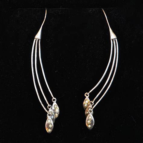 Sterling Silver Earrings With Long Curved Wires Ovals With Seed