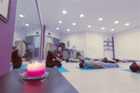 Group of People at the Gym in a Yoga Class Stock Image - Image of female, exercise: 79700425