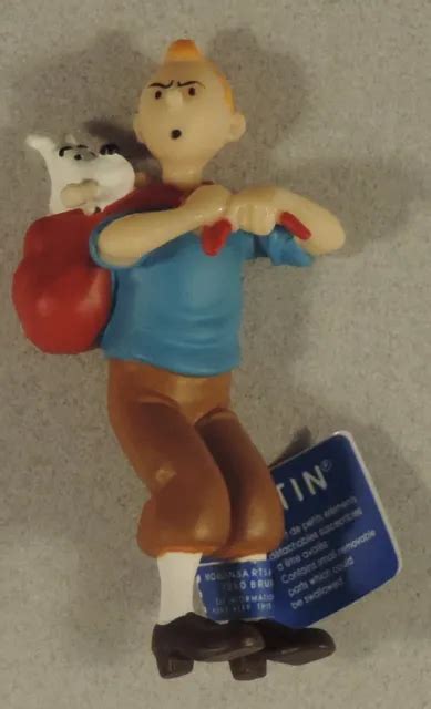 TINTIN HERGE FIGURINE Plastique Tintin Portant Milou Dans Son Dos