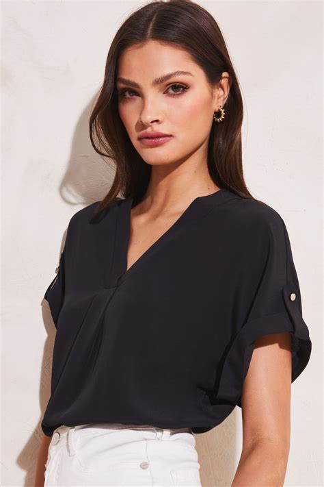 Buy Lipsy Black Utility V Neck Short Roll Sleeve Top From The Next Uk