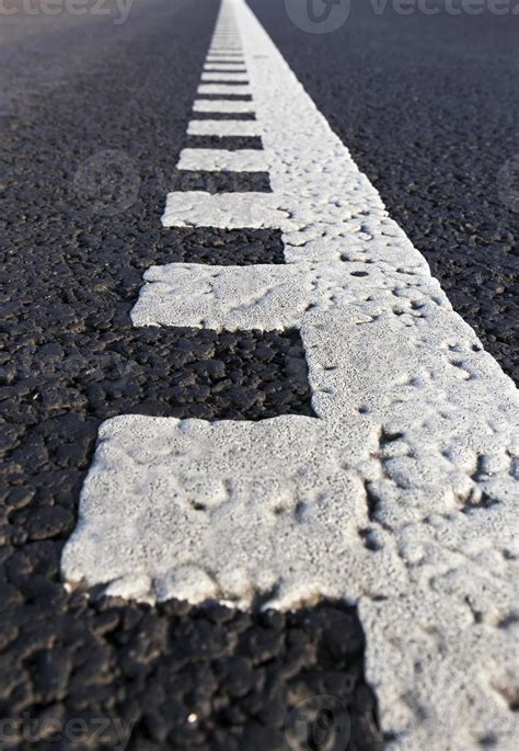 white road markings 9427350 Stock Photo at Vecteezy