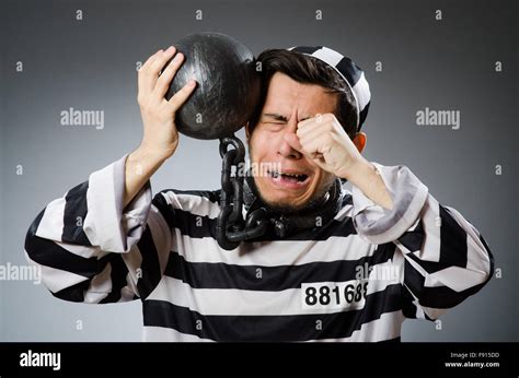 Prison inmate in funny concept Stock Photo - Alamy