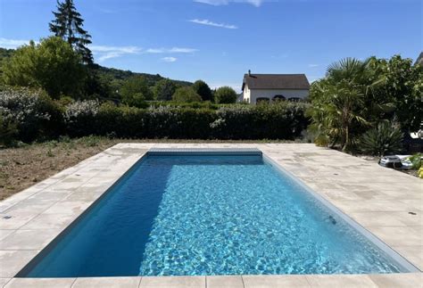 Piscine enterrée avec volet immergé YVELINES PISCINES SERVICES L