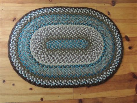 Items similar to 100% wool completely handmade braided rug. on Etsy