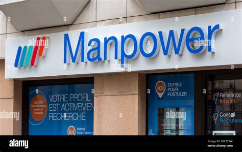 Sign and logo of a Manpower office. Manpower is a brand of the ...