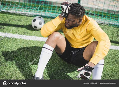 African American Goalkeeper At Pitch Stock Photo Arturverkhovetskiy