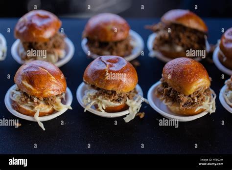 rows of mini sliders/miniature burgers Stock Photo - Alamy