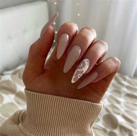 Chic And Timeless Nude Almond Nail Designs