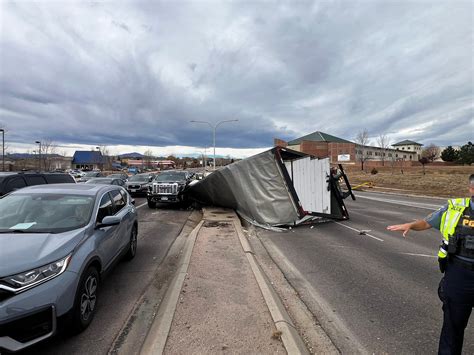 Rollover at Stetson Hills and Powers leaves 2 injured; Hazmat on scene