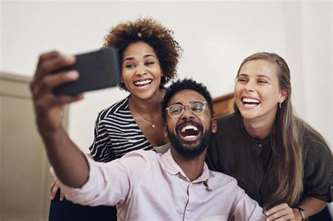 Premium Photo Big Smiles From The Top Creative Team Shot Of A Group