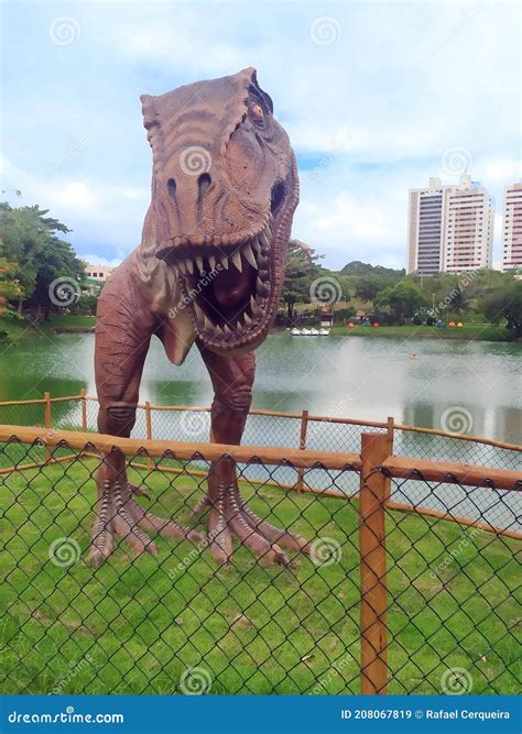 Photo Of The Statue Of A Tyrannosaurus Rex In The Dinosaur Park In