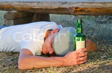 Drunk Man Lying On The Ground Stock Image Colourbox