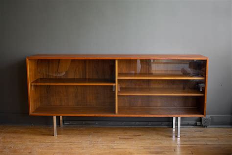 teak glass console reside