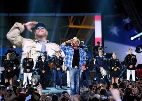 Airman Sings With Country Star During Salute To Troops Air Force