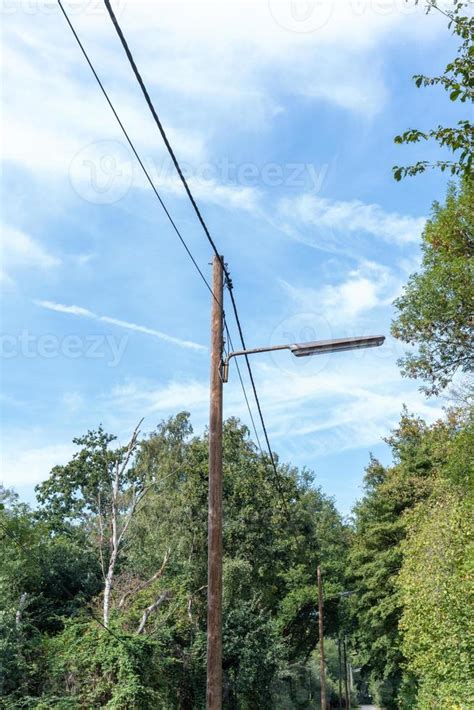 Street light with wooden pole in the countryside 11697545 Stock Photo ...