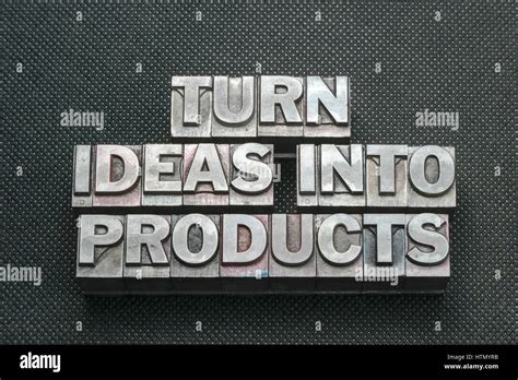 Turn Ideas To Products Phrase Made From Metallic Letterpress Blocks On