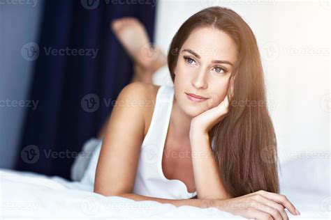 Young Beautiful Woman Waking Up In Her Bed Fully Rested 15765934 Stock