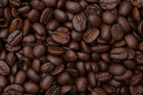 Roasted coffee beans background, brown coffee background 44234548 Stock Photo at Vecteezy