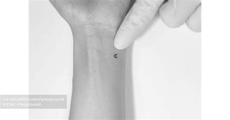 Micro Crescent Moon Tattoo Located On The Wrist