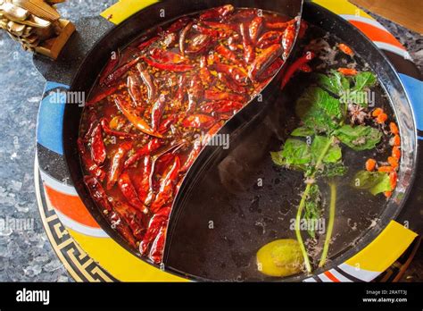 Yin Yang Hot Pot Chinese Cuisine Food Hot Pot Two Styles Top View Of The Hot Pot A Table Of
