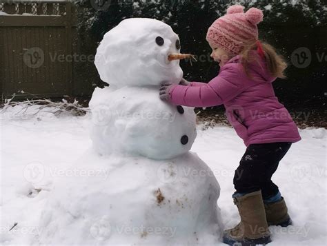 Kids building a snowman in winter day AI Generative 28950173 Stock ...