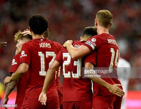 Jordan Henderson Captain Of Liverpool Celebrates After Scoring The