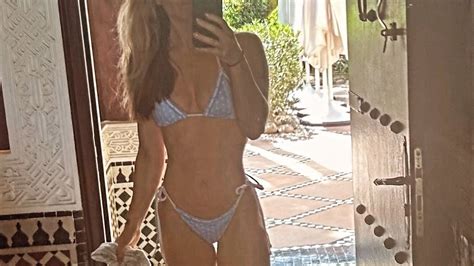 Chloe Madeley Flaunts Her Incredible Figure In A Tiny Blue Bikini Before Slipping Into A