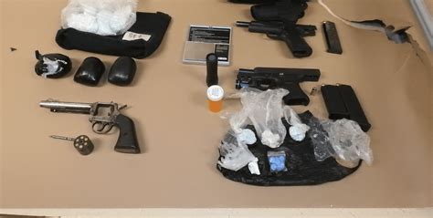 Detectives Seize Pills Guns And Body Armor In South Seattle Narcotics