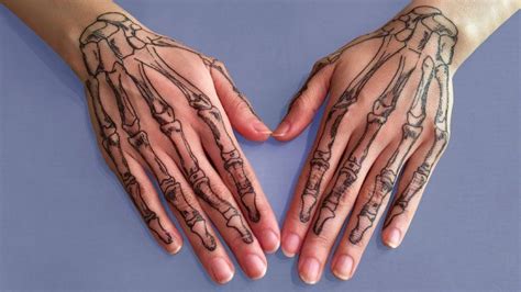 Terrifying And Cool Skeleton Hand Tattoos