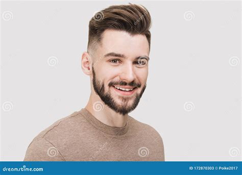 close  portrait  handsome smiling young man laughing joyful