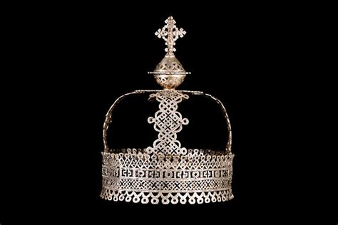 An Ashanti Silvered Metal Patterned Crown Decorated With An Eagle