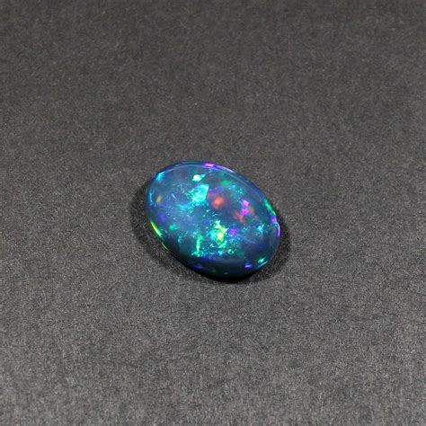 Natural Black Multi Fire Ethiopia Opal X Mm Oval Cabochon Ring Size