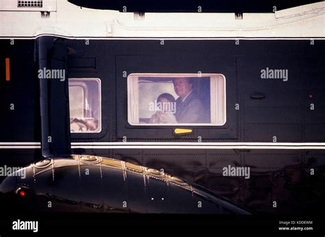 President Jimmy Carter holds grandson Jason Carter in the window of ...