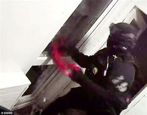 Moment Armed Police Storm Home Of Naked Gunman At 4am As He Attempts To Hide A Weapon Behind