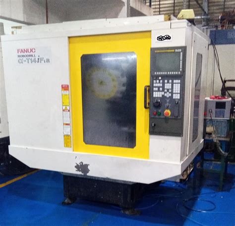 CENTRO DE USINAGEM VERTICAL FANUC ROBODRILL T14i Fa ANO 2011