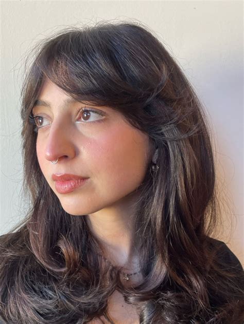 Effortless Deep Brunette Long Layered Cut With Curtain Bangs