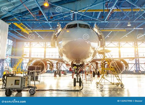 Aircraft On Maintenance Of Engine And Fuselage Repair In Airport Hangar Stock Image ...