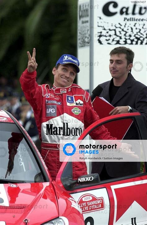 Gilles Panizzi Fra Peugeot Wrc Celebrates His Second Position On