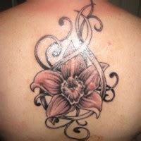 Lovely purple orchid tattoo by Liz Venom - Tattooimages.biz