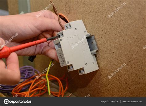 Electrical engineer installing remote switch - close-up — Stock Photo ...